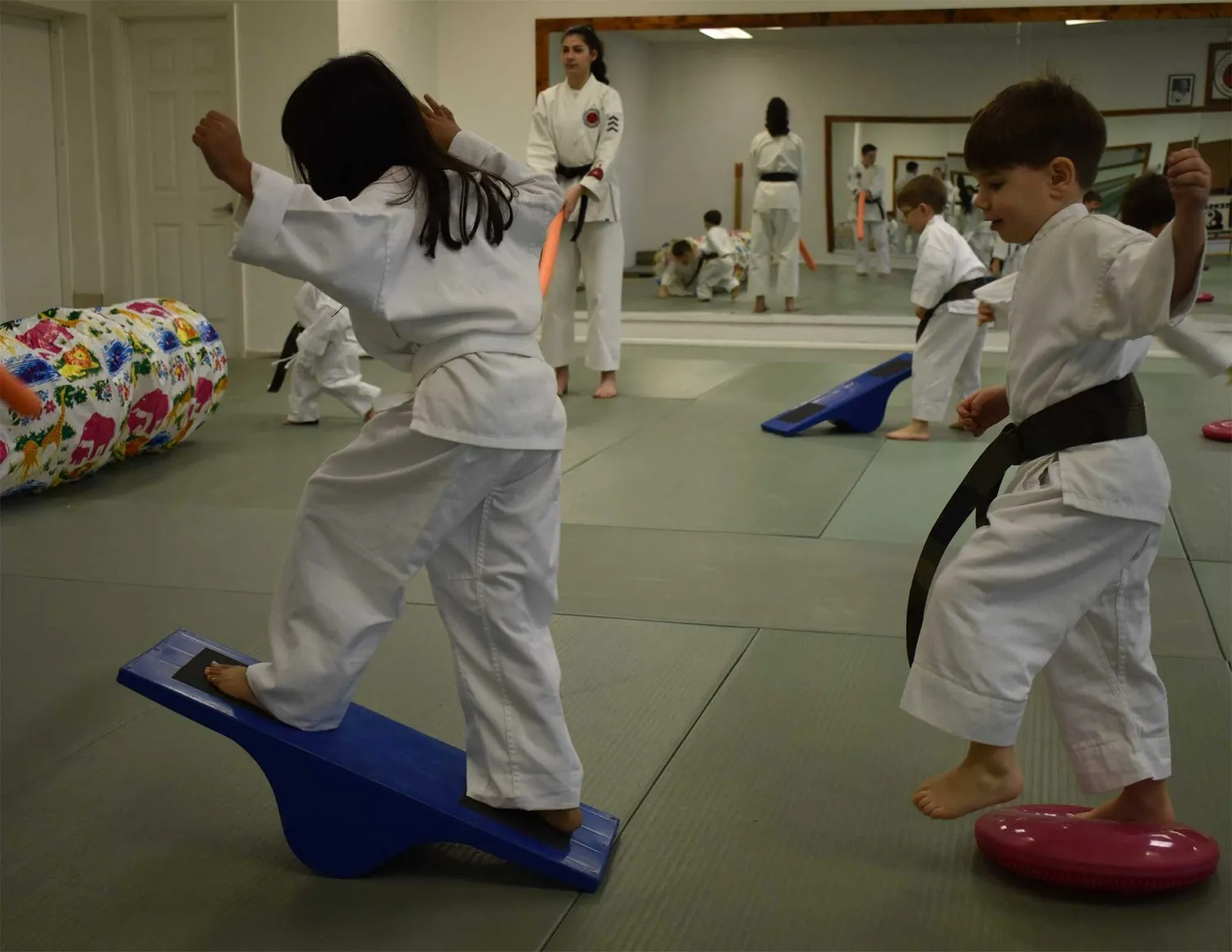 kids taking martial arts lessons